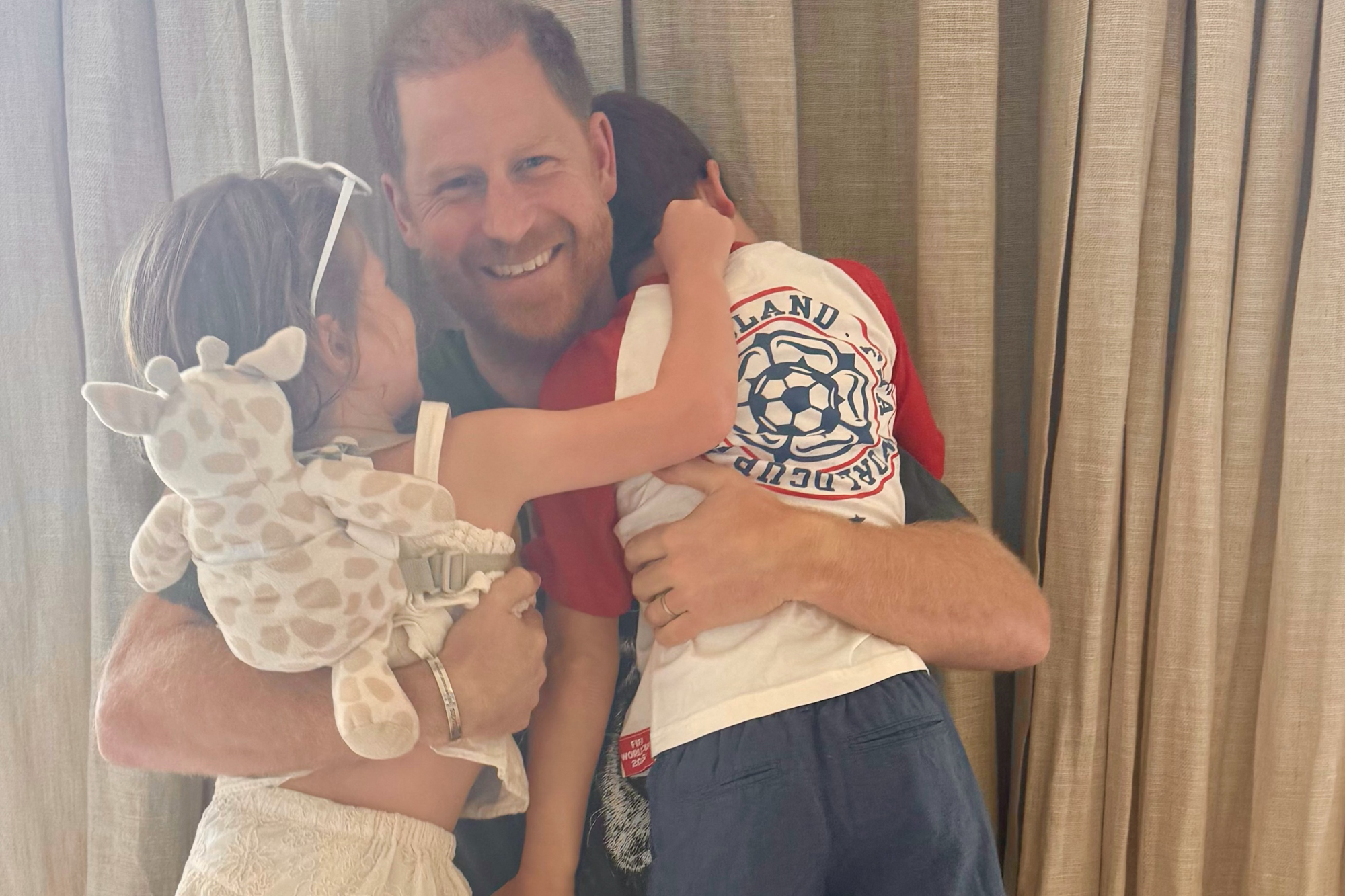 Archie Rocks England Shirt Ahead of UK Trip