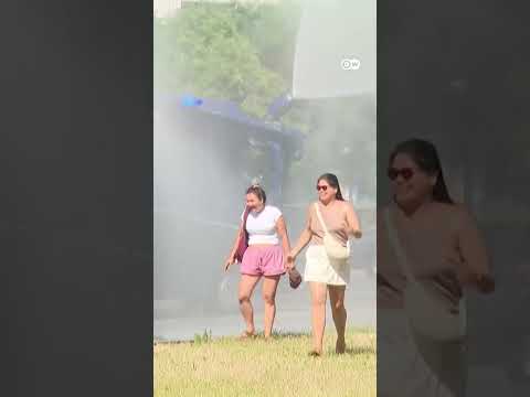 Berlin Police Use Water Cannons Amid Heat Wave