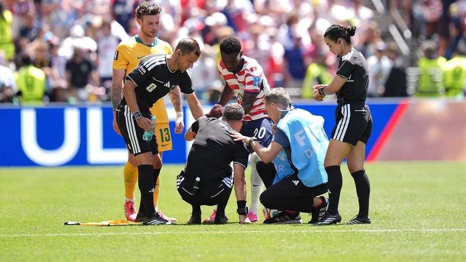 Balogun Helps Ref After Cramps in USA vs Australia Match