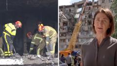 Watch: Russian attack leaves gaping hole in Kyiv residential building