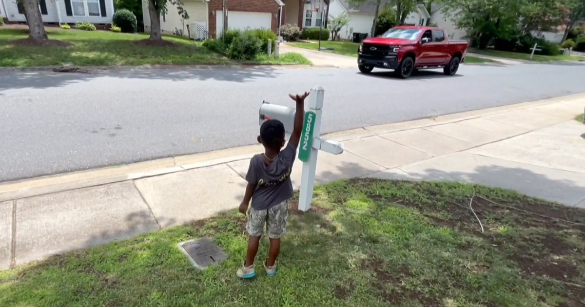 A boy's simple habit of waving to his neighbors transformed his community