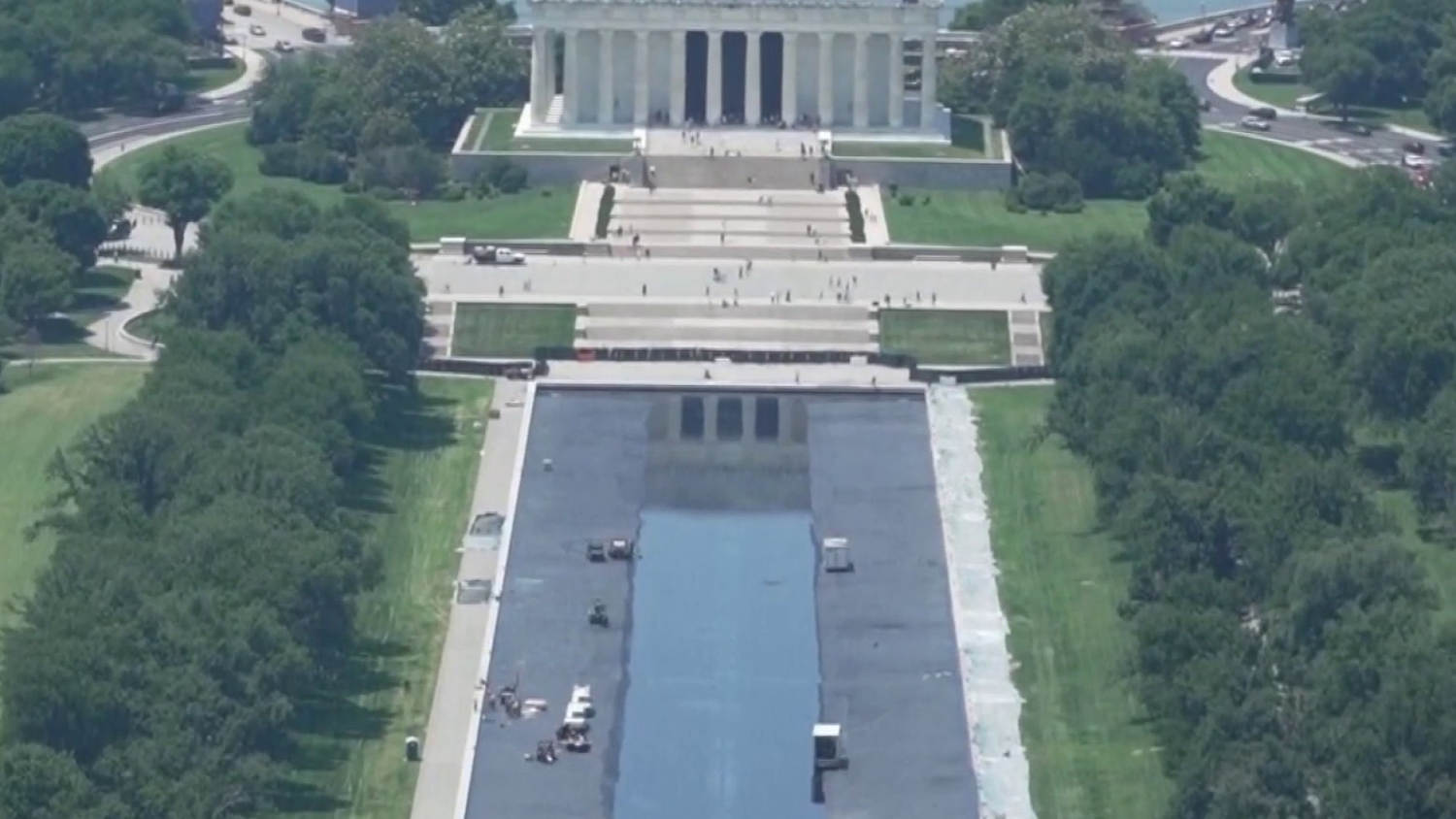 Charges dropped against former Olympian over reflecting pool damage