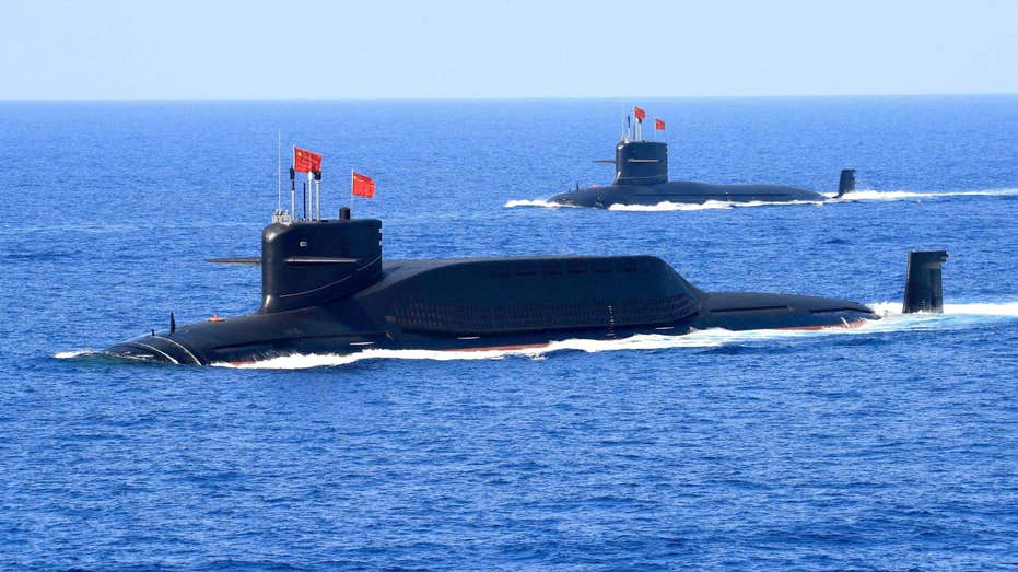 China launches rare submarine ballistic missile as Pacific allies strengthen defense ties before NATO summit