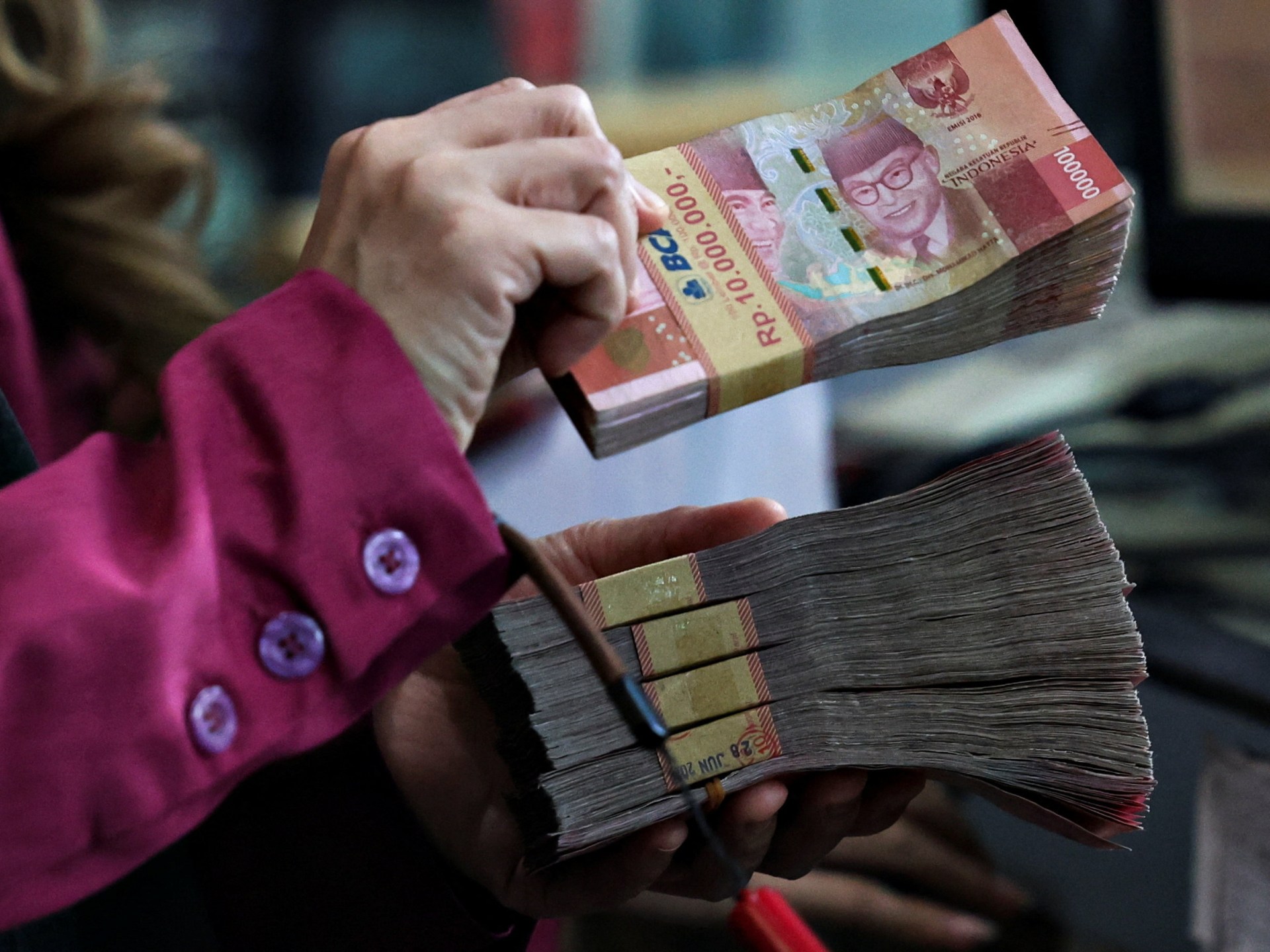 Indonesia’s anti-graft prosecutor quits after police seize gold and cash