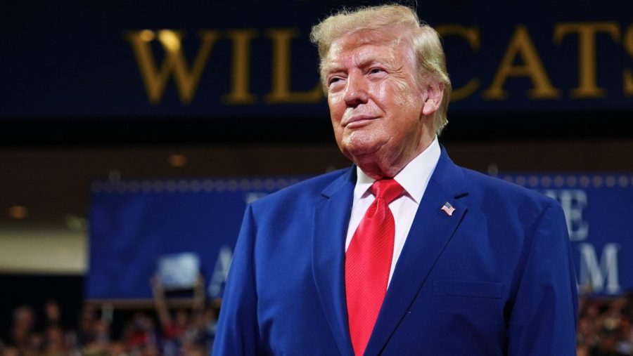 Trump homes in on midterm message in Michigan