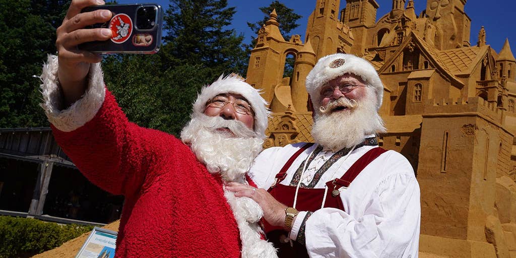 It's Christmas in July as hundreds of Santas go on the march in the middle of a stifling summer heat wave