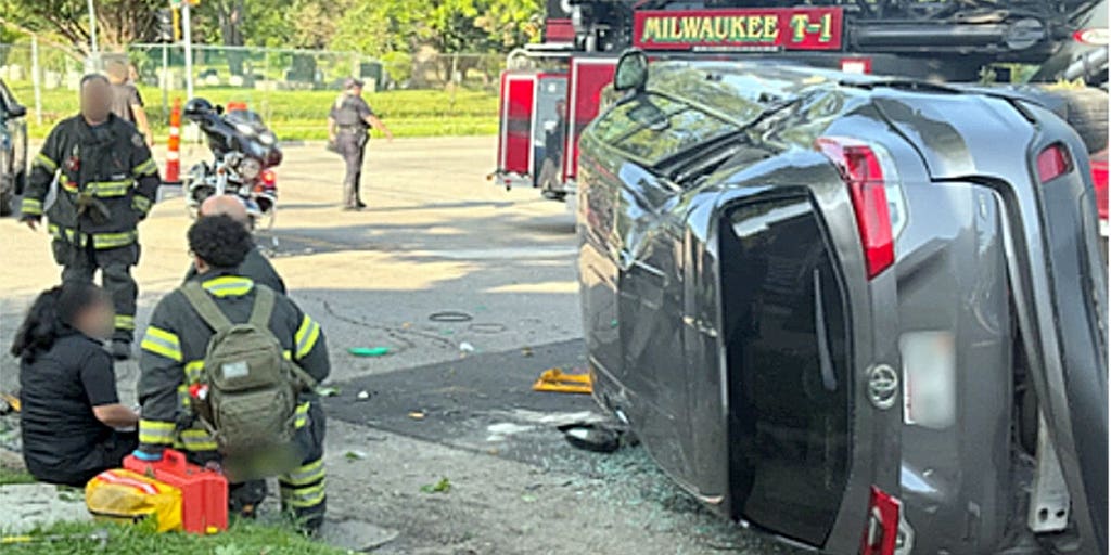 SEE IT: ICE agents pause arrest operation to save woman in rollover crash