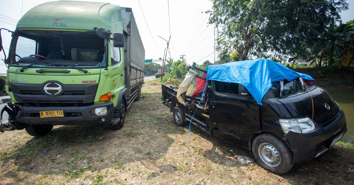 Truck carrying wedding guests hit on Indonesia highway, killing 13, police say