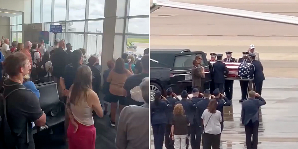 Travelers unite in powerful moment of silence as fallen US service member returns home