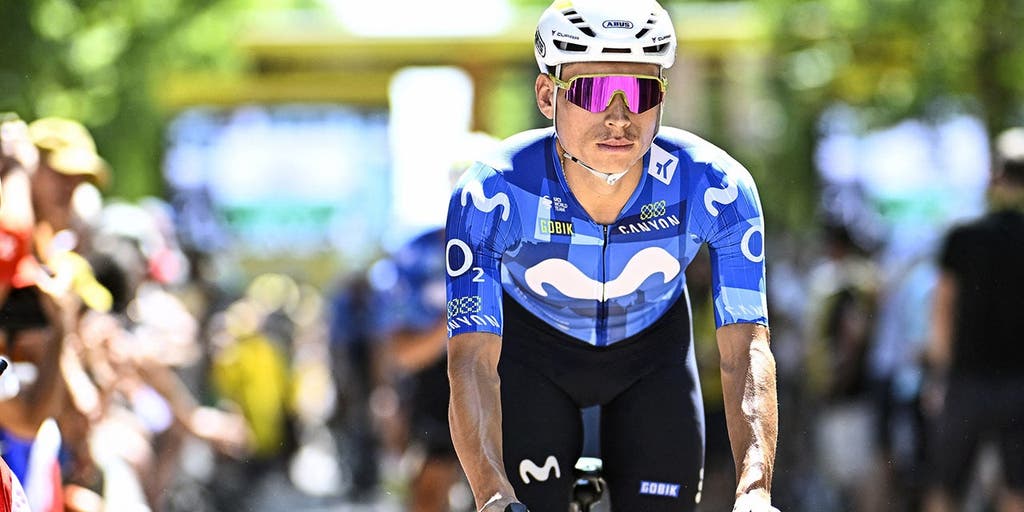 Tour de France rider crashes into the back of support vehicle that slammed on the brakes