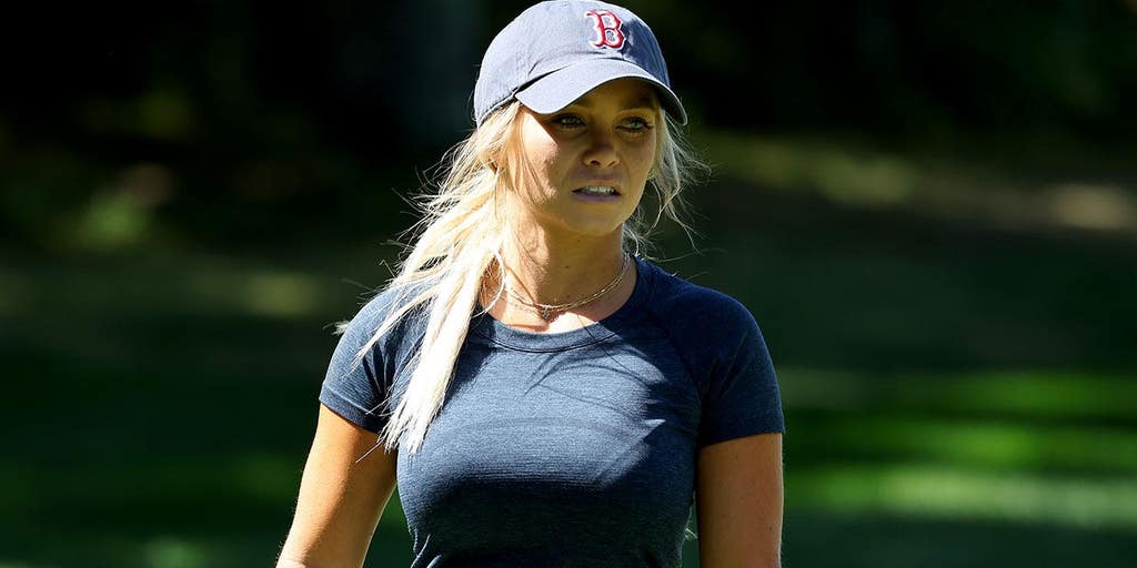 Hailey Ostrom is back defending summer at the lake armed with her golf club and bikini