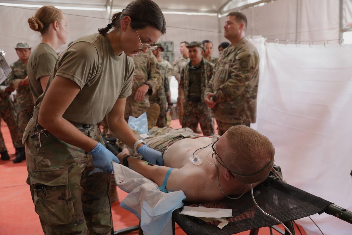 US and Malaysian Soldiers conduct joint walking blood bank training
