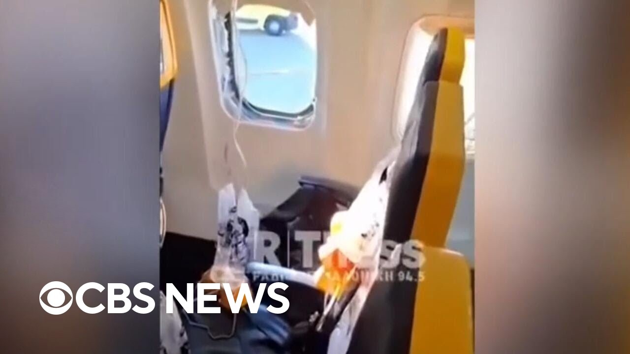 Passenger almost sucked out of plane after window breaks during flight