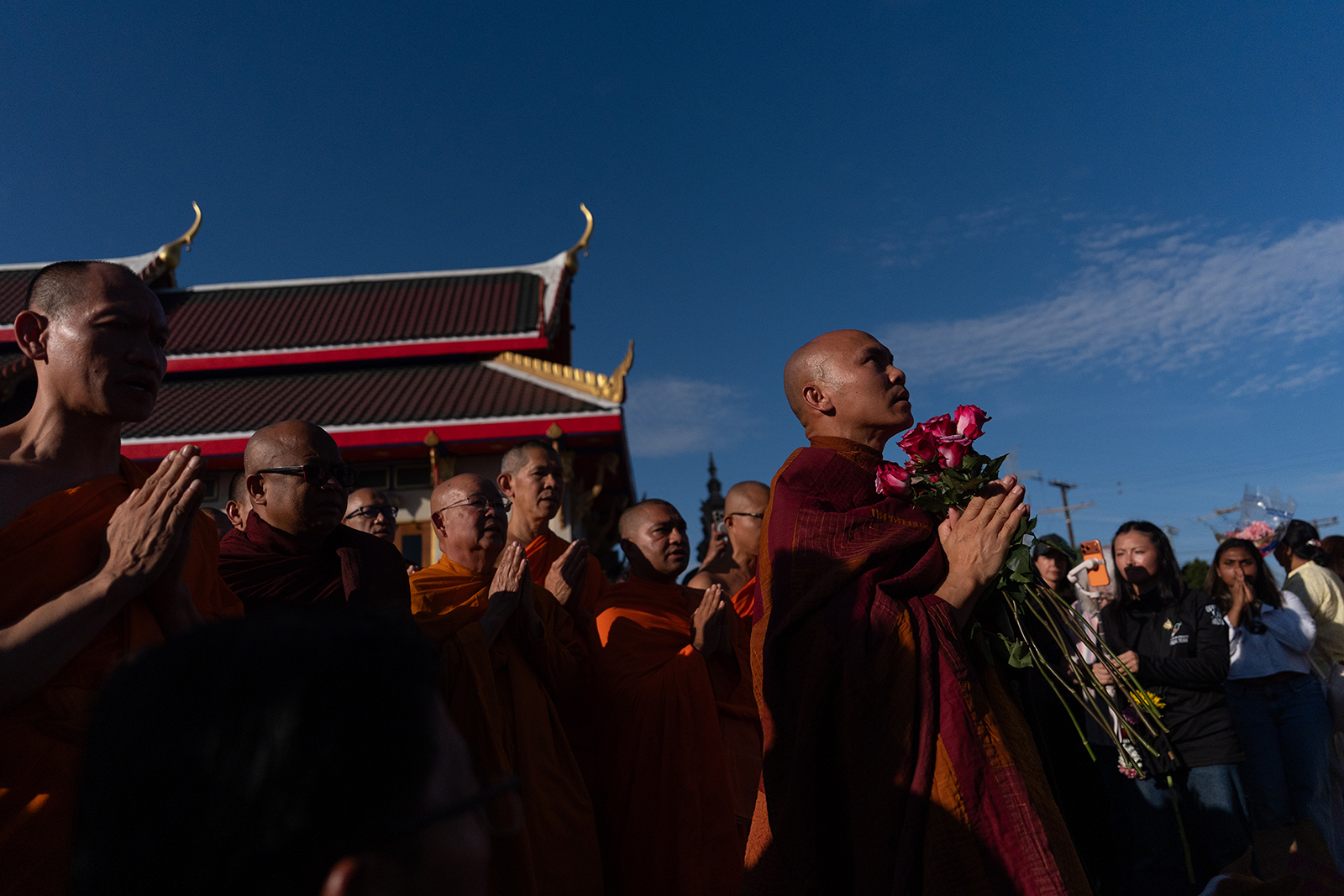 Photos of the Week: A Buddhist monk and his dog, earthquake recovery efforts