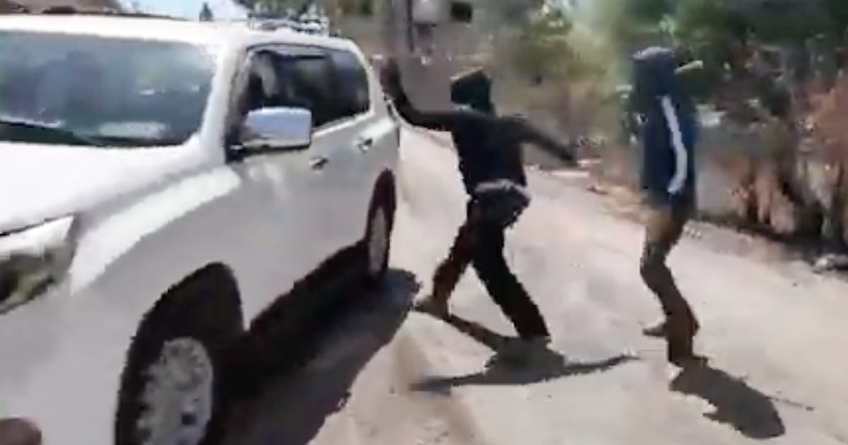 Palestinian woman and NBC News team attacked by masked Israeli settlers in West Bank