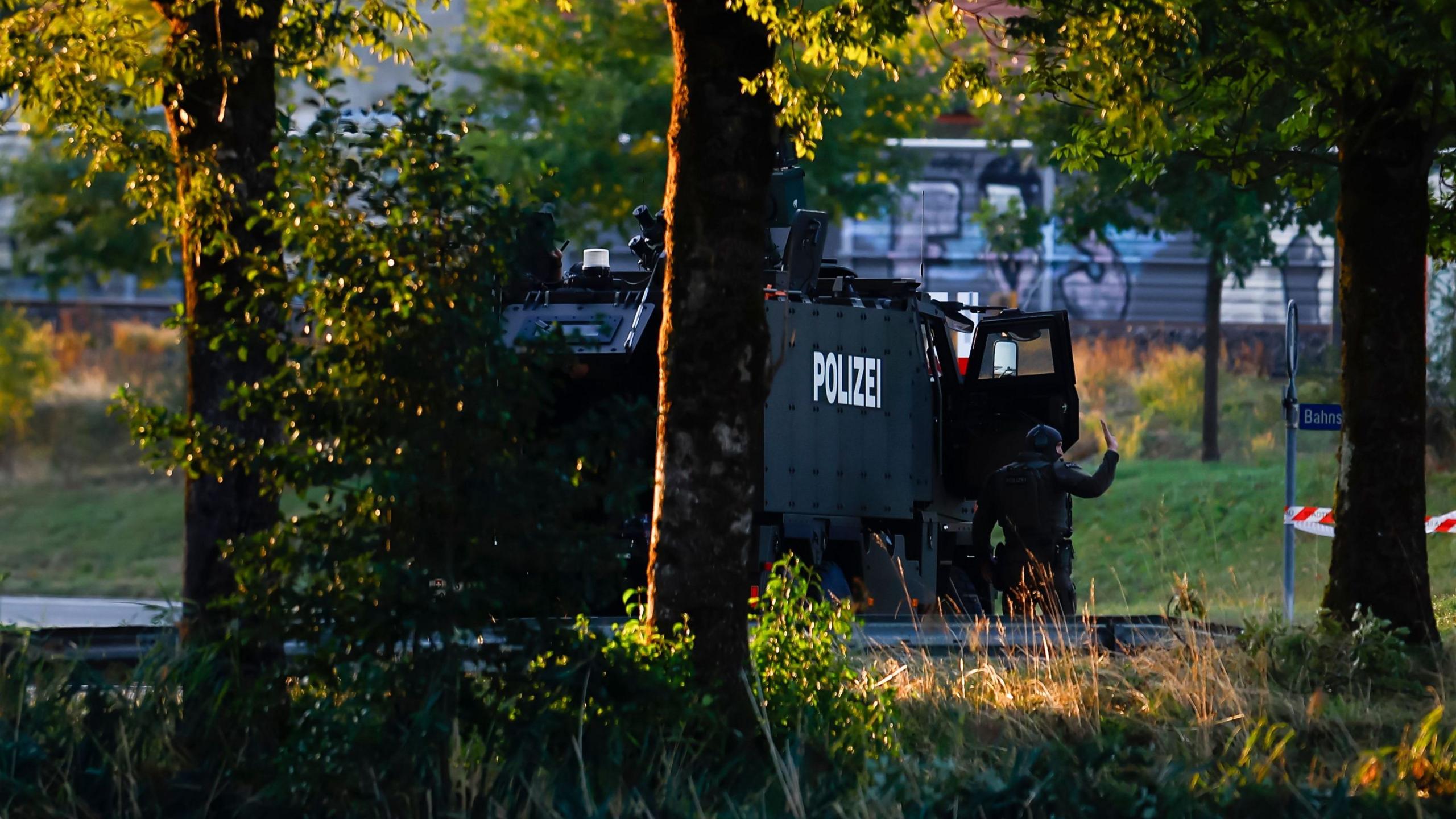 Manhunt after shooting at Swiss rave kills woman, 22, and injures five
