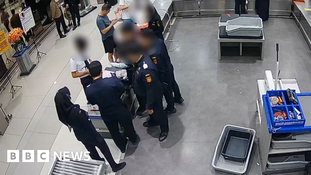 Moment pilot caught with 70,000 ecstasy pills at Indonesian airport
