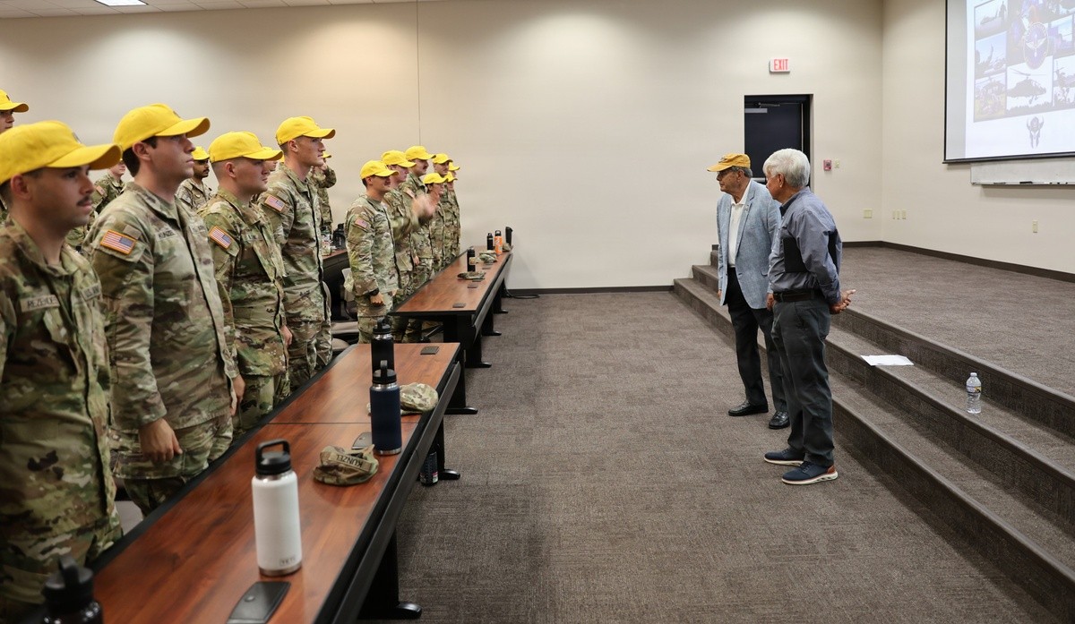 “Flight school class…don your hats!” Legacy Army Aviation leaders speak to new flight school students