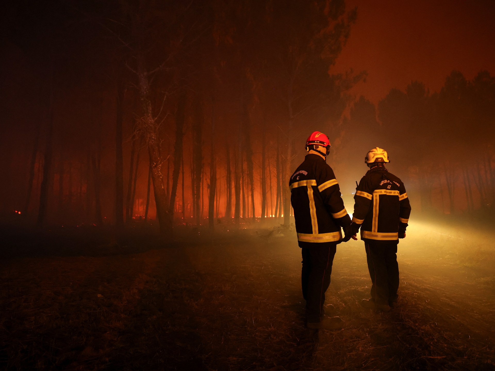 Wildfires force thousands to flee as blazes spread across Europe