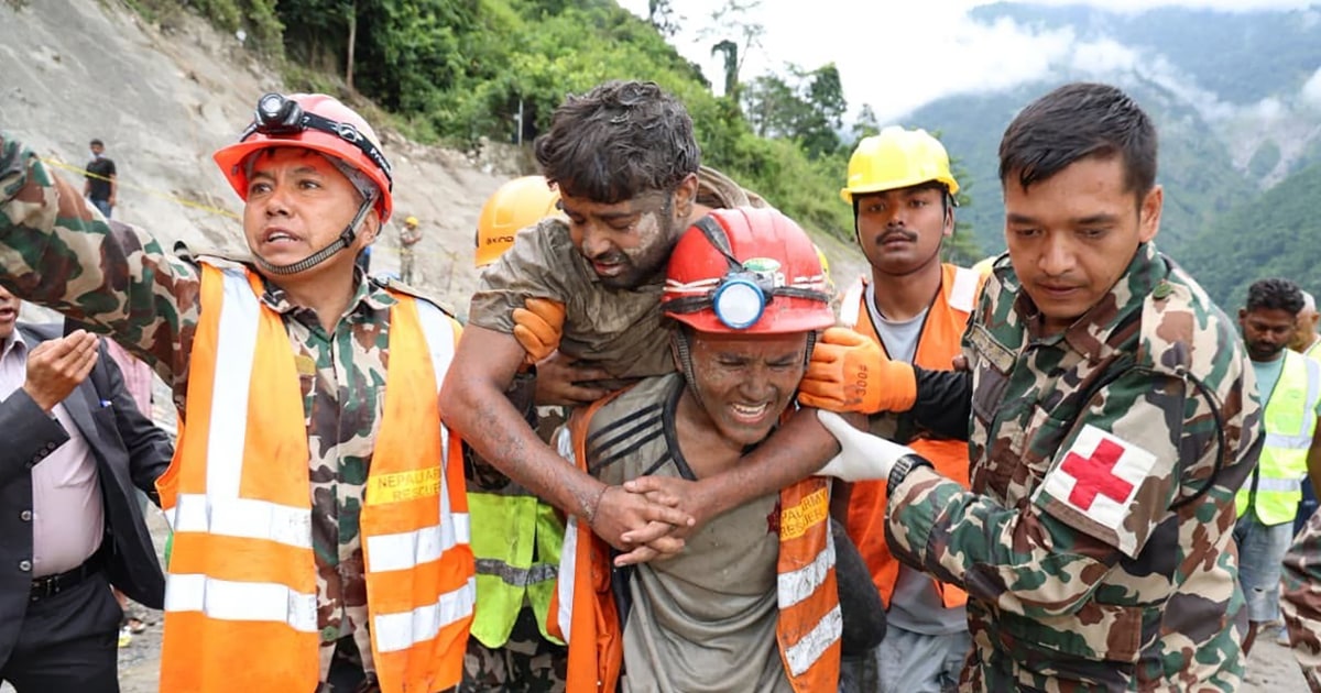 Two trapped workers pulled alive from Nepal tunnel more than a week after deadly floods