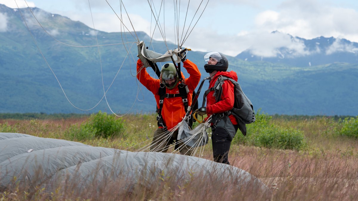 Rescue team parachutes to remote Alaska river, rafts across to reach hunters