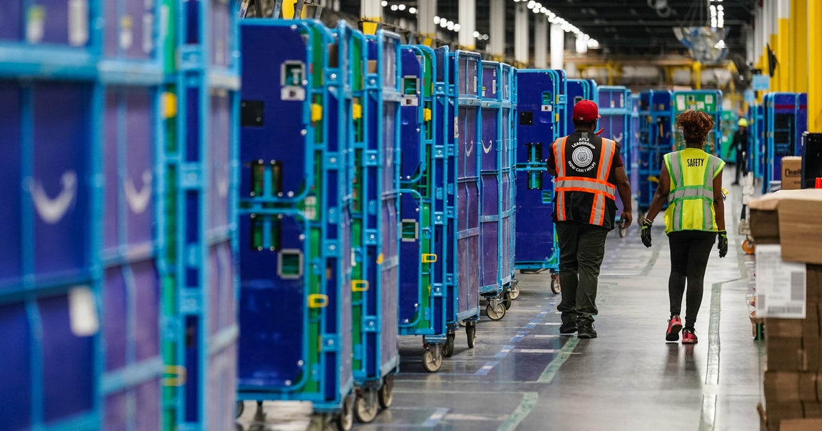 Amazon raises starting pay to $20 an hour and adds Whole Foods perks