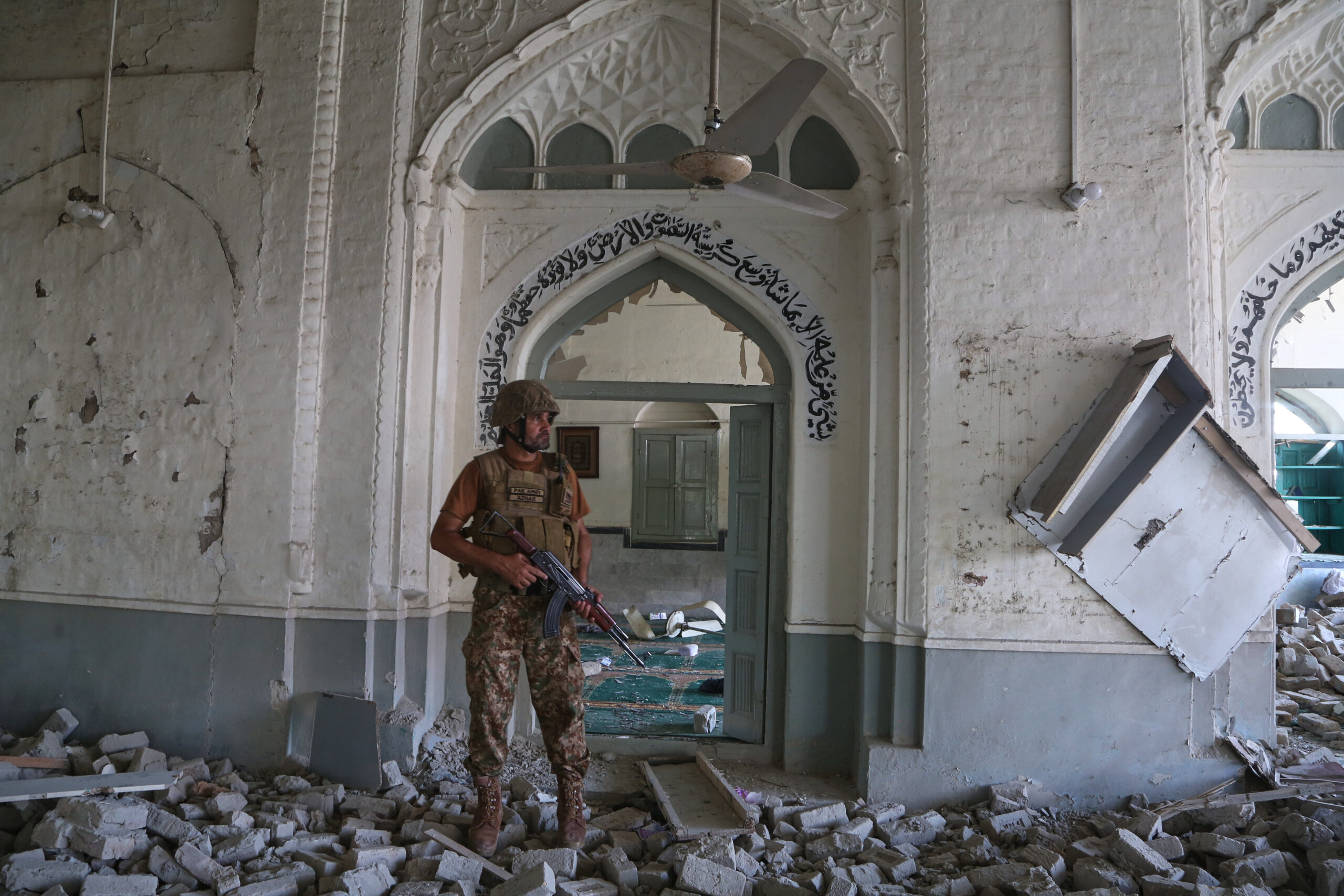 Bombing at mosque near police offices in Pakistan kills at least 21