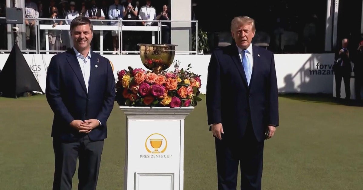 Trump attends Presidents Cup; dueling protests held outside Medinah – CBS News