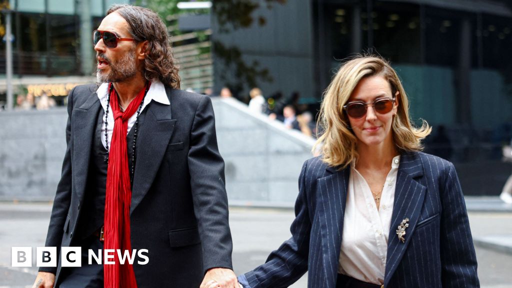 Russell Brand's wife tells his rape trial he is 'kind and a wonderful father' – BBC