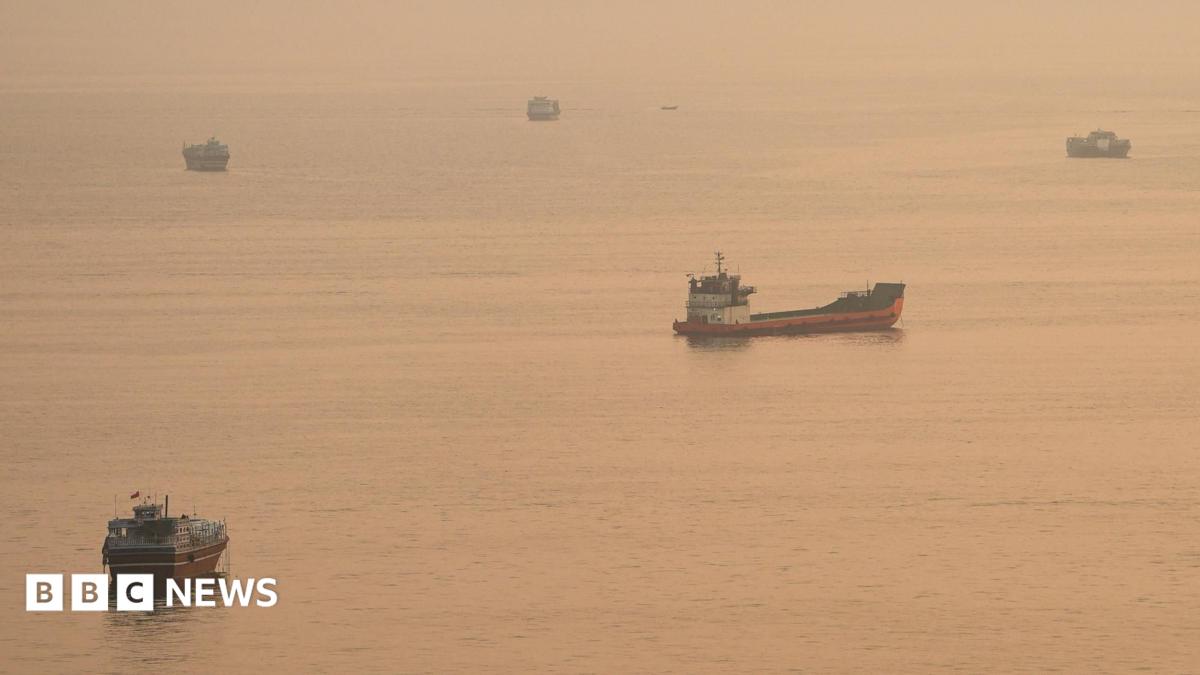 Container ship hit by projectile sinks in Strait of Hormuz, Singapore says