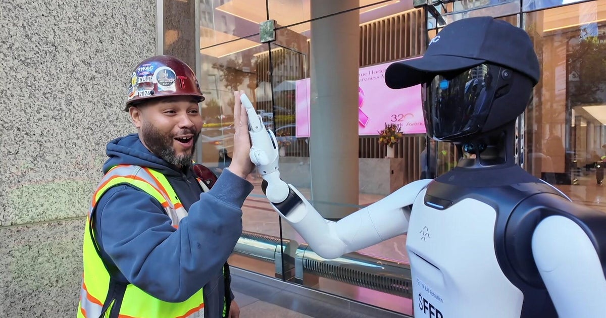 Video shows humanoid AI robot roaming NYC streets – CBS News