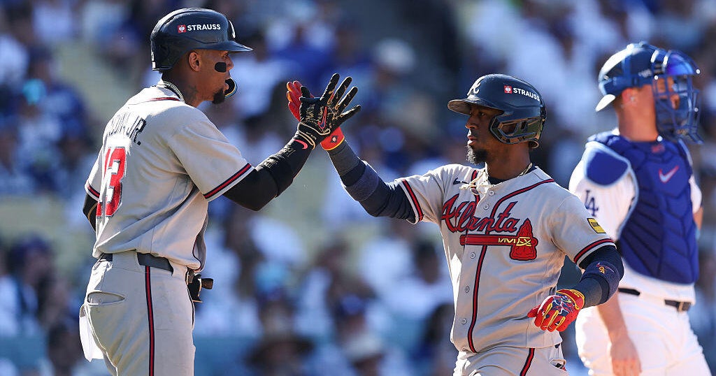 Ronald Acuña Jr., Ozzie Albies returning to Braves after team picks up options – CBS News