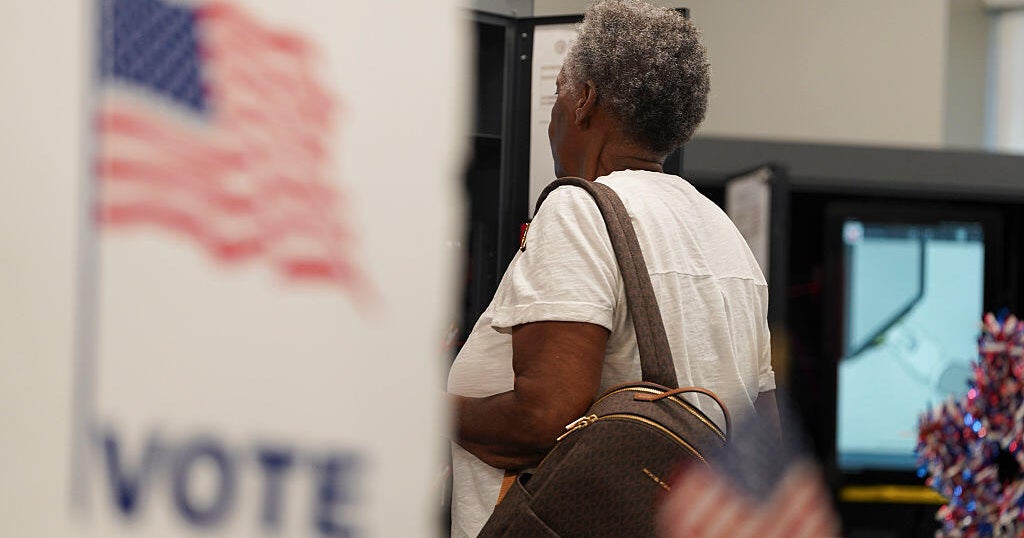 Older Georgia voters drive early turnout as rising gas costs hit home – CBS News