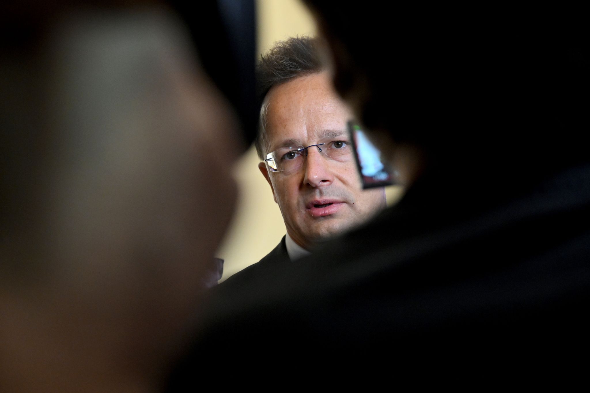 Hungary’s former foreign minister grilled over ties to China's BYD automaker while in office – Midland Daily News