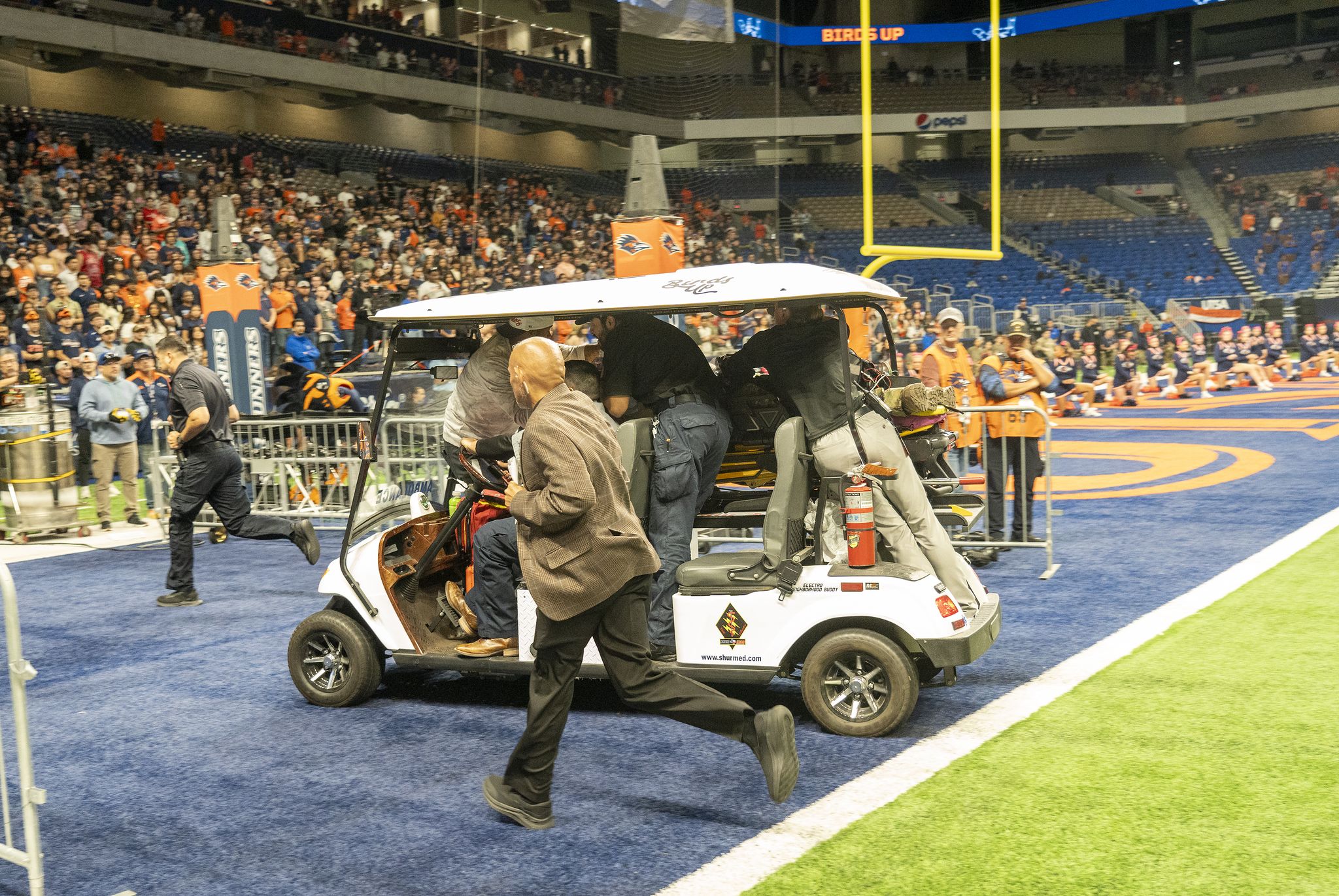 Service member dies after falling from Alamodome rafters in skills demo before UTSA game – San Antonio Express-News