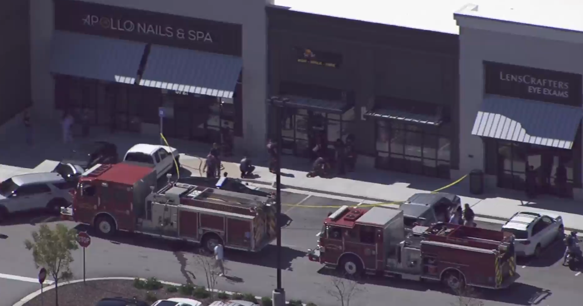 Off-duty Georgia firefighter's toddler son dies in shopping center crash – CBS News